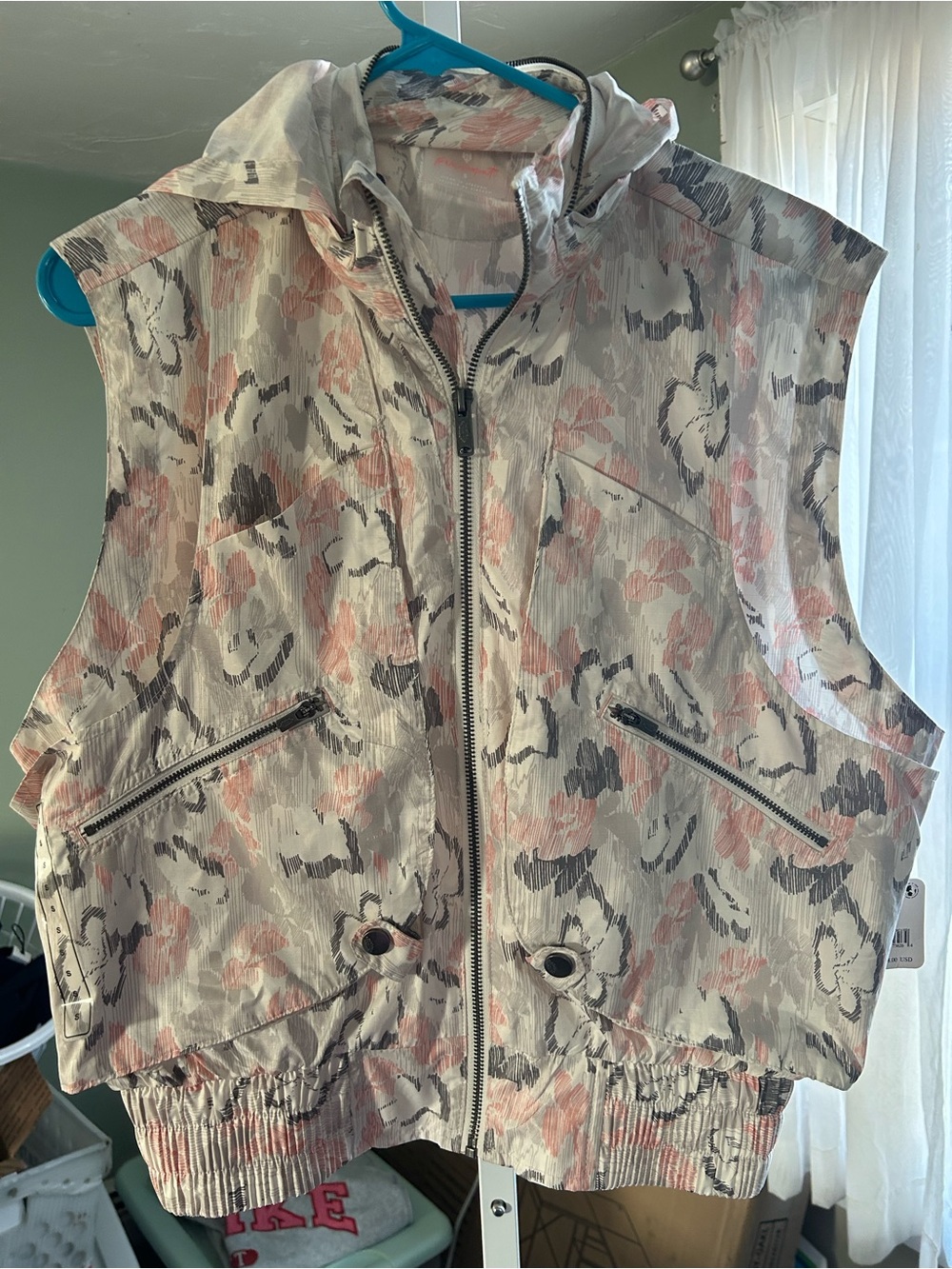Free People Sleeveless Hooded Zip Front Vest 
With hood